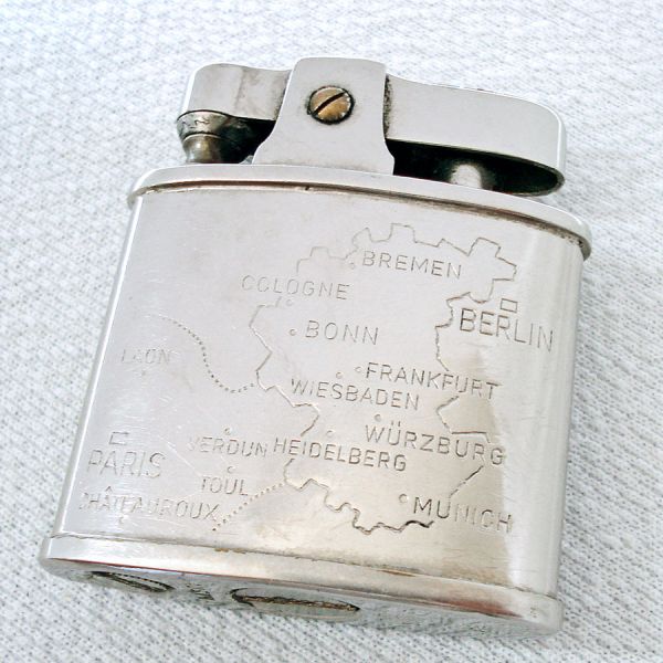 Austrian Tiki Petrol Lighter With Map Germany France