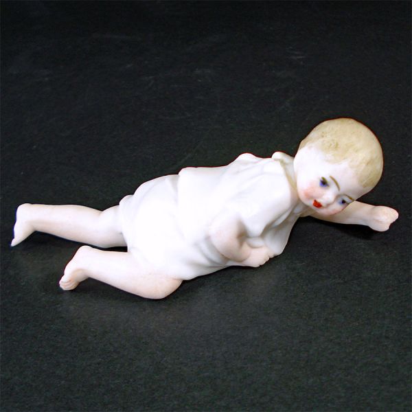 Small Crawling German Bisque Piano Baby Figurine