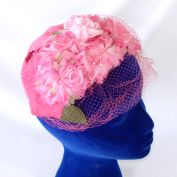 Bright Pink Flowers Close Fitting Fascinator Hat With Veil
