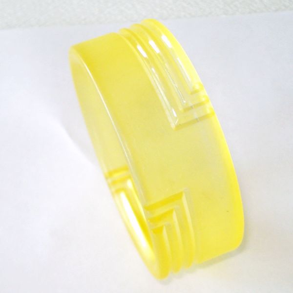 Carved Yellow Satin Lucite Bangle Bracelet
