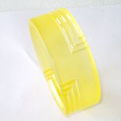 Carved Yellow Satin Lucite Bangle Bracelet